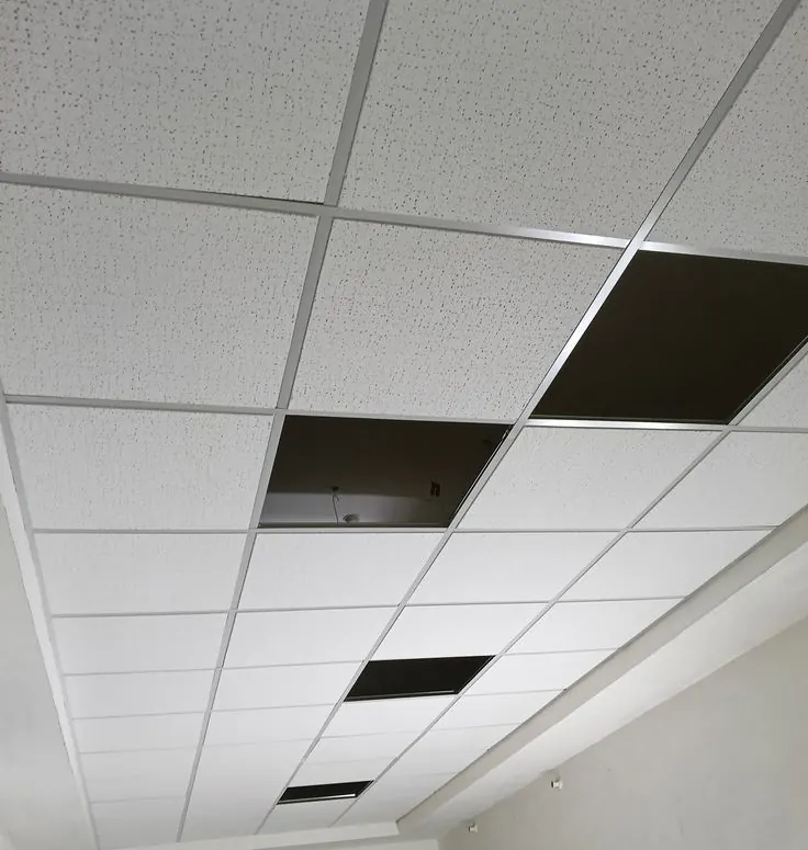 2×2 grid ceiling tiles with some tiles not yet fitted