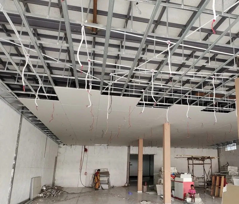 Ceiling grid framework installation in a large commercial space