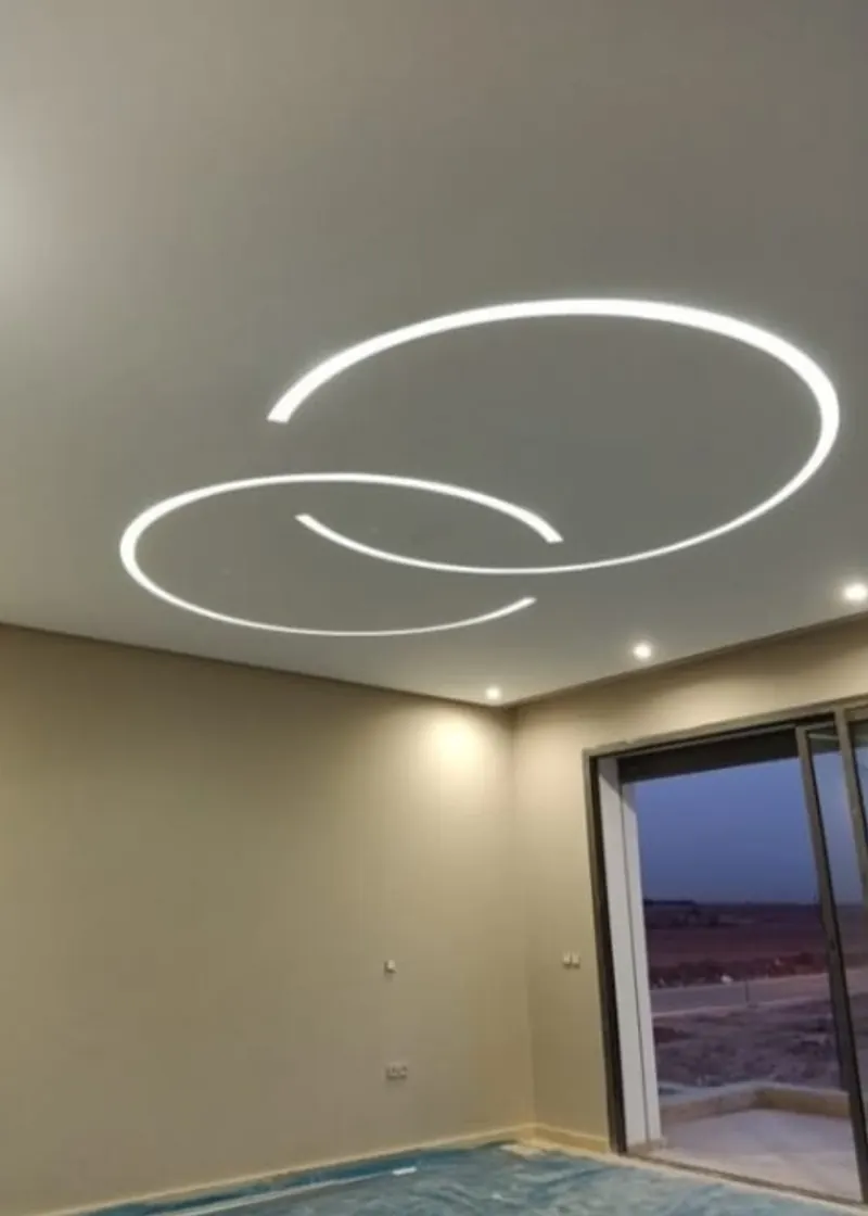 Gypsum ceiling with a curved LED strip light design