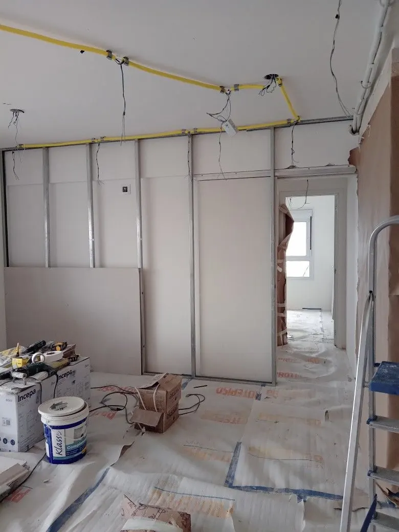 Gypsum board partition wall during installation
