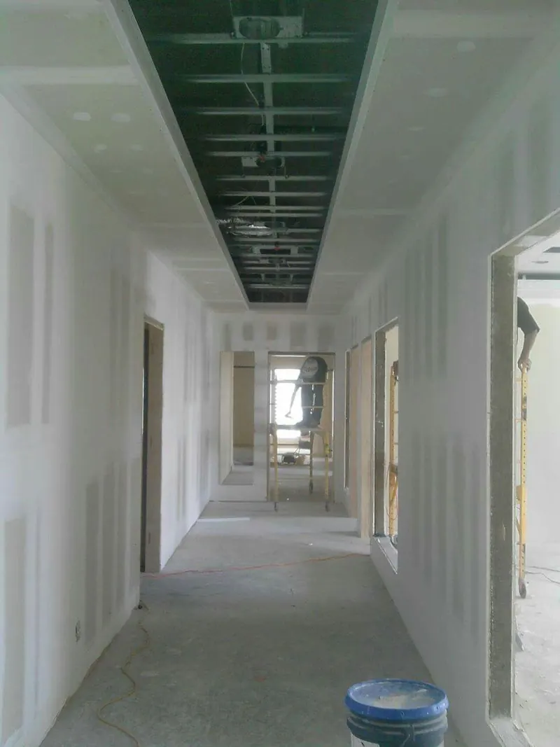 Corridor with gypsum board partition walls during installation