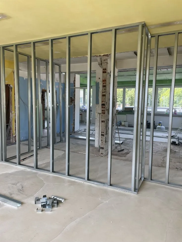 Metal stud framing for partition walls in an office space