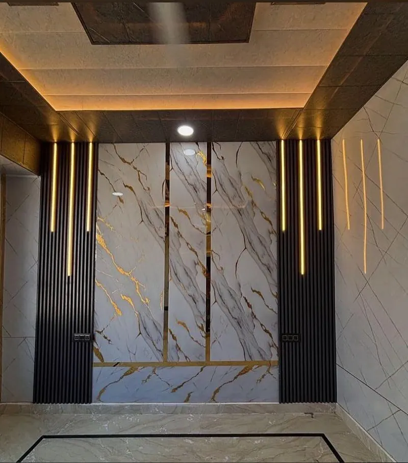 Wall panels with marble-effect sheets, dark fluted panels and LED strip lighting