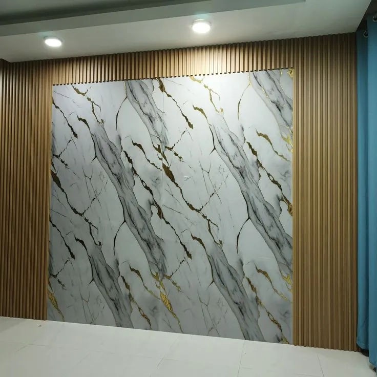 Wood-effect fluted panels beside a large marble-effect wall panel